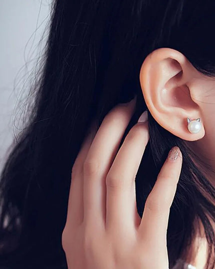 Delicate Sterling Silver Cat-Themed Pearl Stud Earrings — jewelry gift detail view 3 | Dear Given