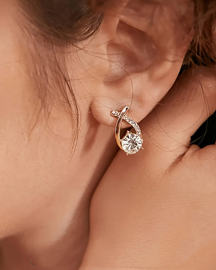 Gleaming Golden Cross Zirconia Stud Earrings
